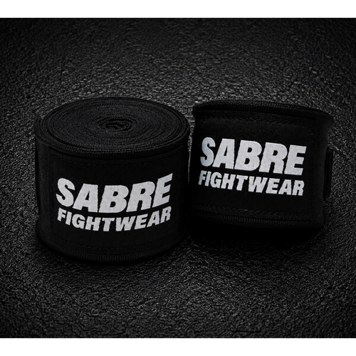 Black boxing hand wraps on a dark textured background