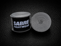 Roll of gray boxing hand wraps with Sabre Fightwear branding on a black background