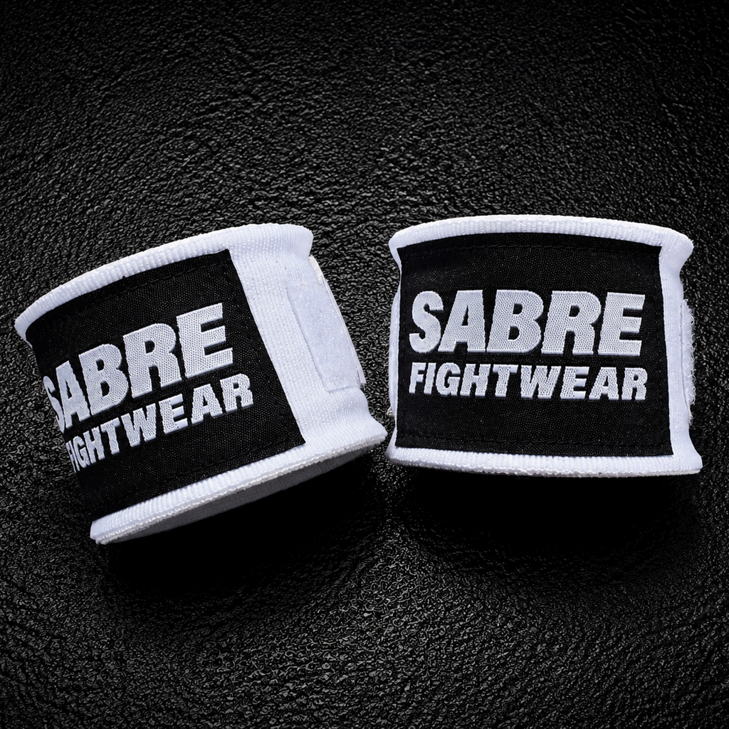 Sabre Fightwear Boxing handwraps on a dark textured background