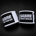 Sabre Fightwear Boxing handwraps on a dark textured background