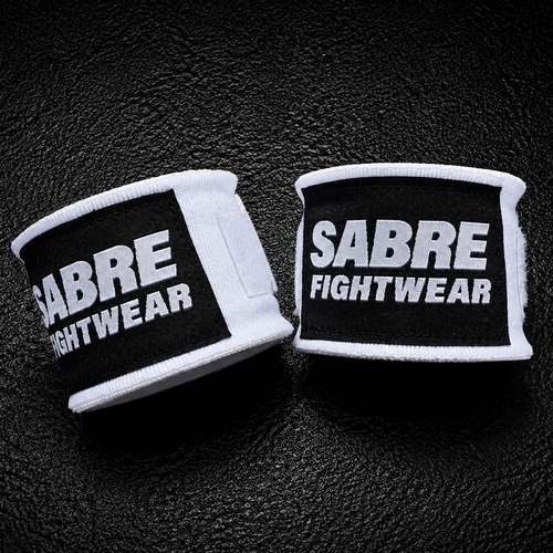 Sabre Fightwear Boxing handwraps on a dark textured background